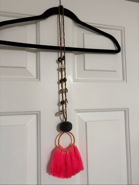 Tassel Pendant Necklace with Hot Pink Fringe, cowrie shells, and coins